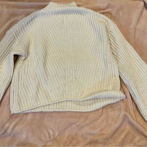 warm sweater, turtleneck, cream color